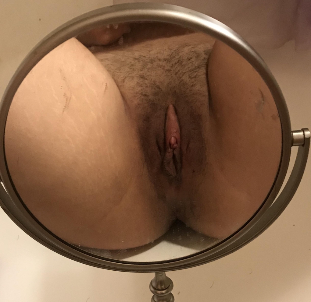 Spreading hairy pussy mirror